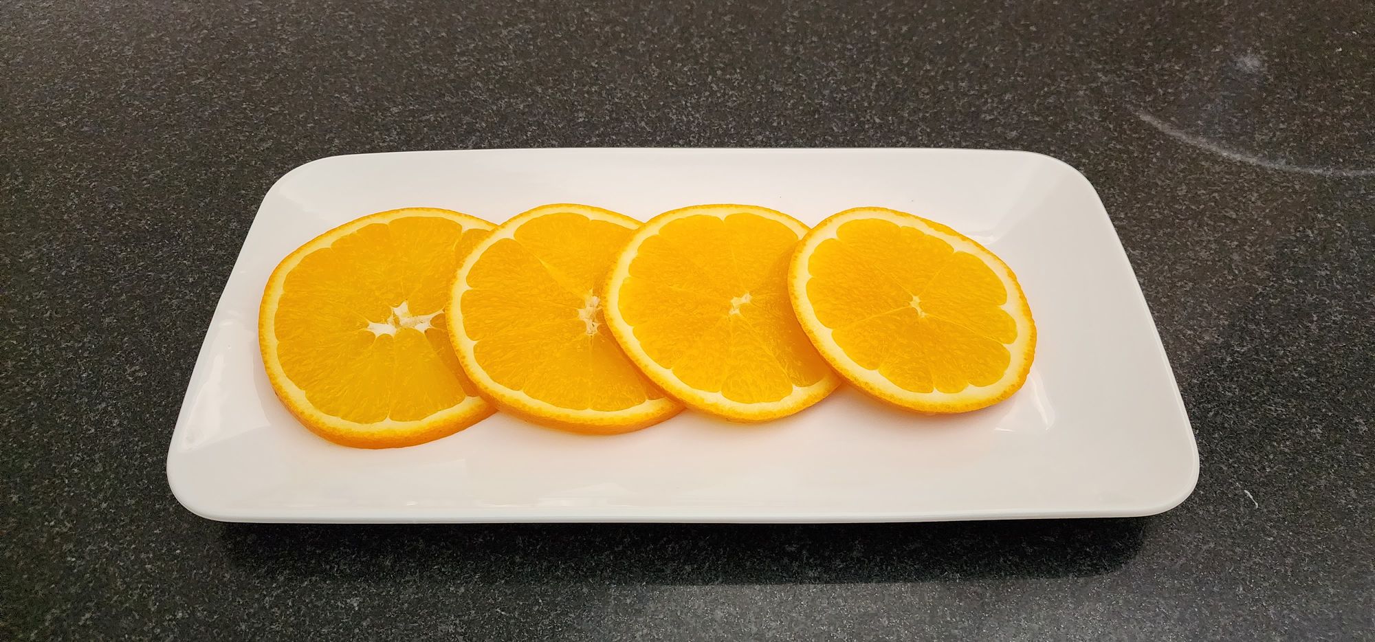 Golden-Tip Kirribilli Breakfast Tea Paired with Zesty Orange Almond Cake